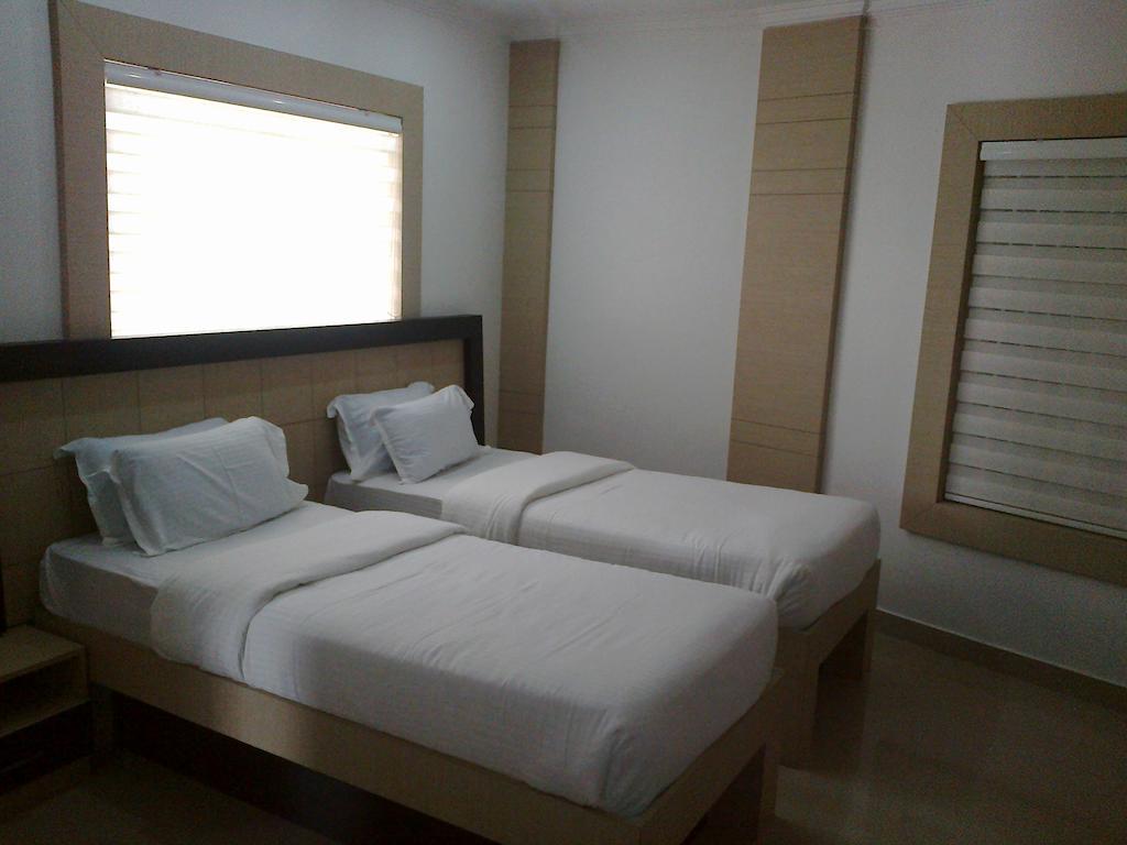 Holiday Hill Hotel y Suites Sultan Bathery Habitación foto